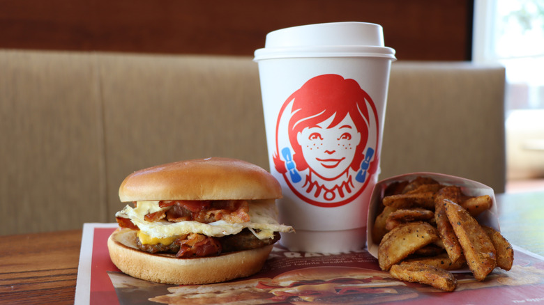 Breakfast Baconator with coffee and fries at Wendy's