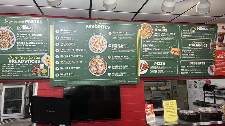 Fazoli's menu board at a one of its restaurants featuring pastas, salads, and desserts