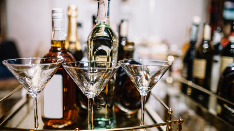 booze bottles with martini glasses