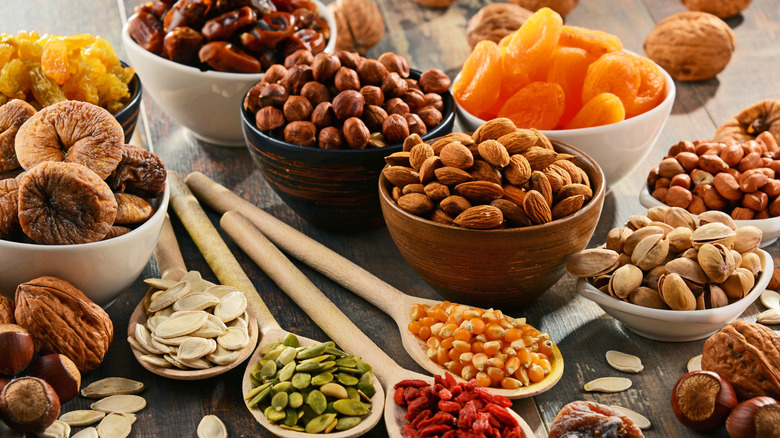 bowls of assorted nuts and dried fruits