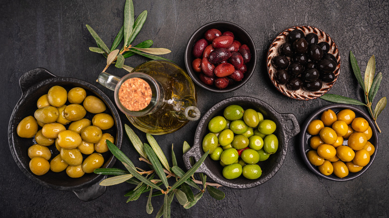 assorted olives in bowls