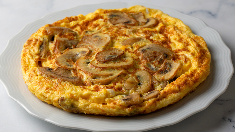 Mushroom frittata on a white plate