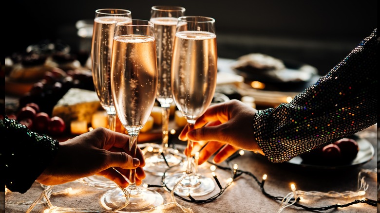 Champagne flutes toasting