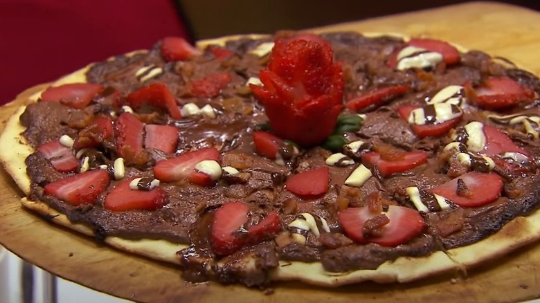 Chocolate bacon pizza with strawberry slices