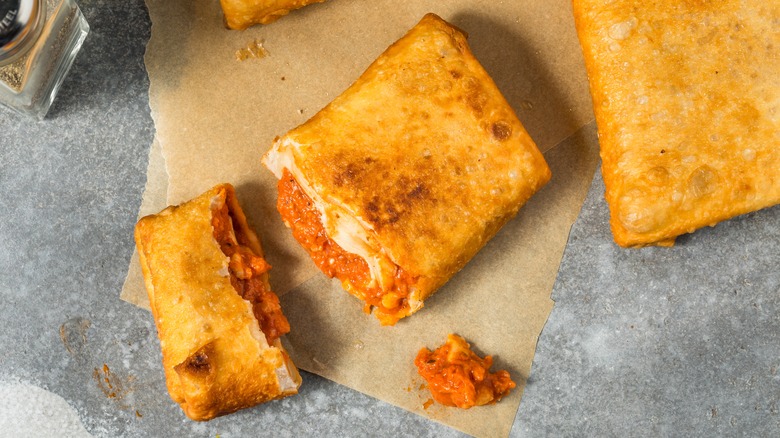 Chicago-style pizza puff on parchment paper