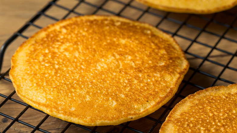 close up of Johnnycake on black grill