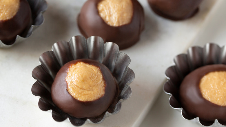 Buckeye chocolate candies in wrappers