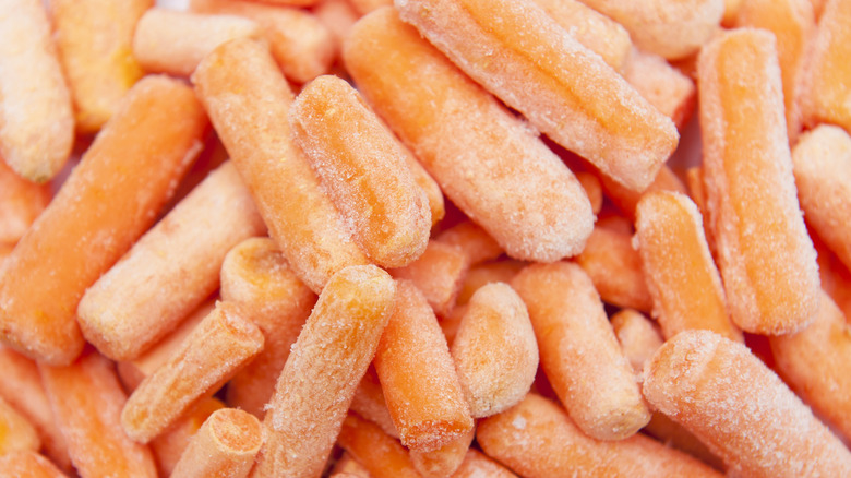 close-up image of frozen "baby cut" carrots in a stack