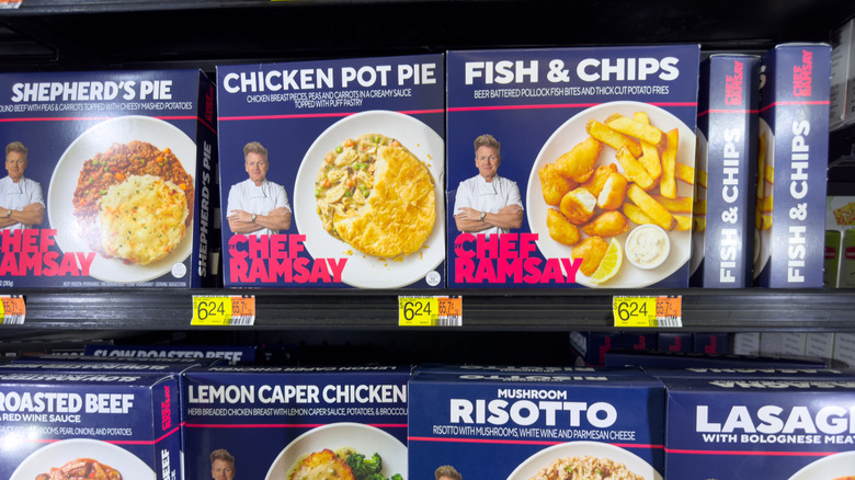 display of frozen foods bearing celebrity chef Gordon Ramsay's brand, including fish & chips, chicken pot pie, lemon caper chicken, and mushroom risotto