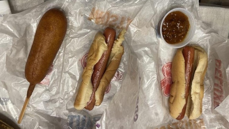 corn dog and hot dogs from Wienerschnitzel on packaging with sauce