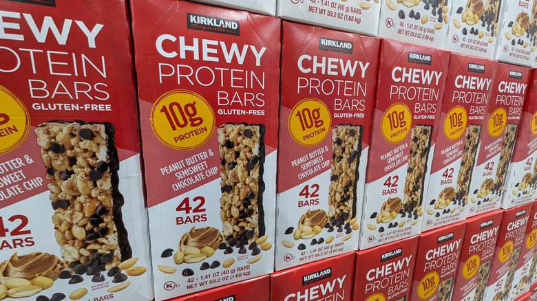 Rows of Kirkland chewy protein bars on display at Costco