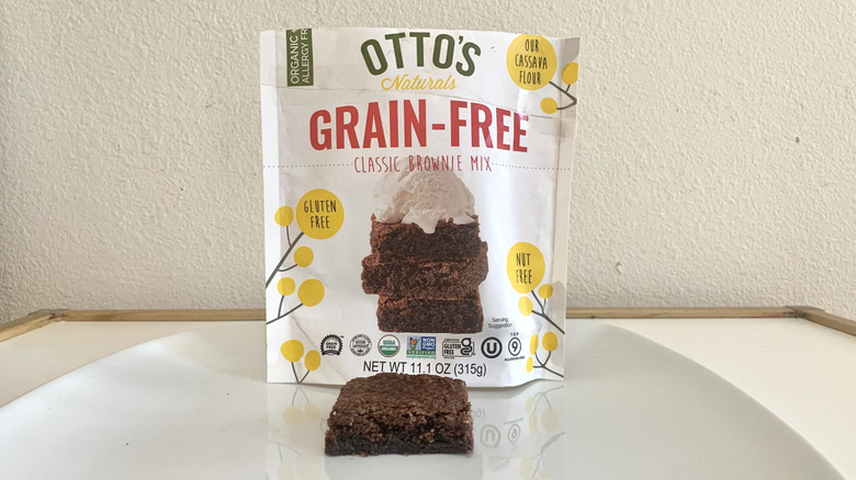 Otto's Grain-Free Gluten-Free Classic Brownie Mix box alongside a baked brownie