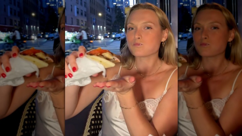 girl eating a gluten-free gyro