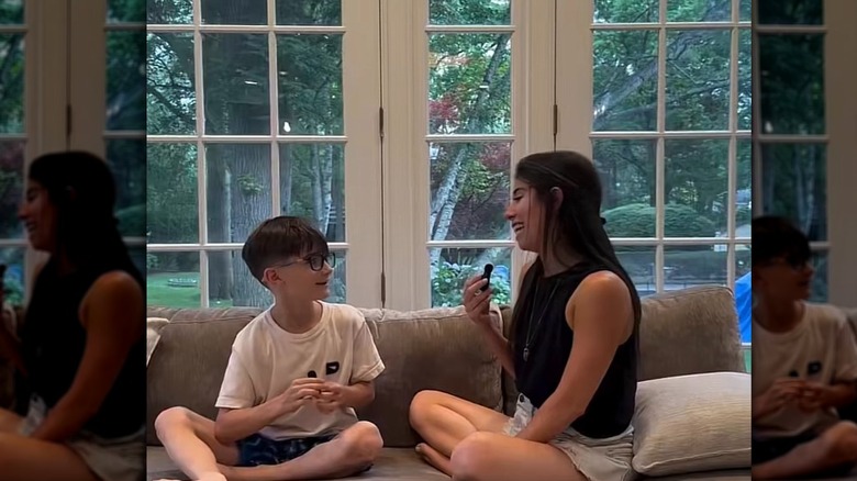 screenshot of a video of The Celiac Shift on TikTok speaking with her son