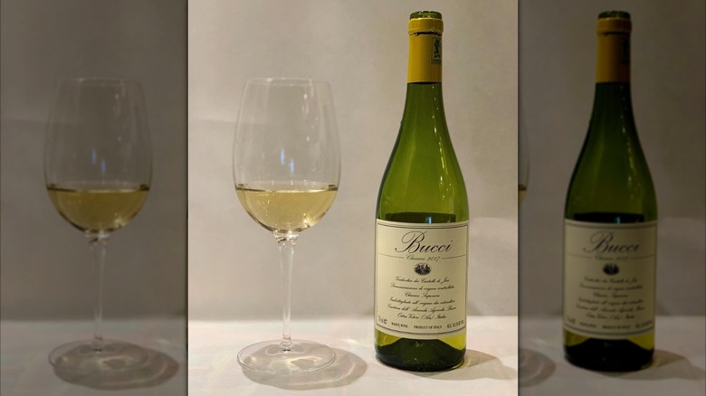 bottle and glass of white wine