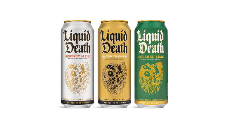 Three cans of liquid death, berry, mango and lime flavored placed against a white background