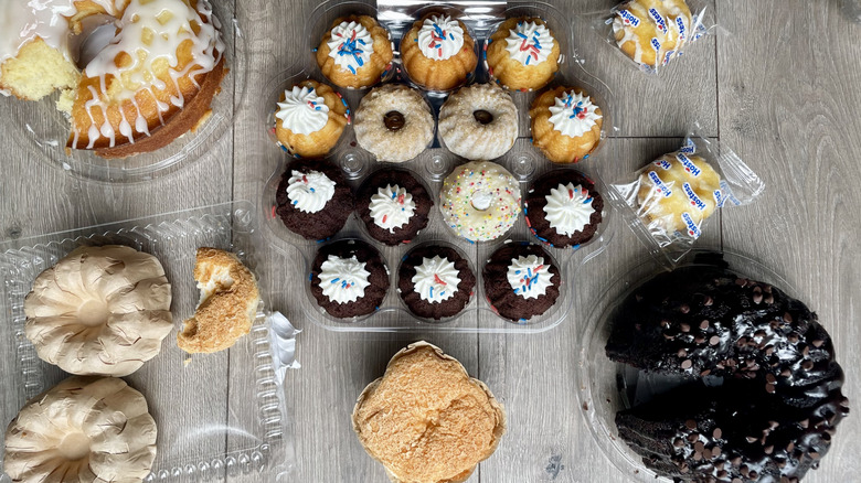 Numerous Bundt cakes displayed with plastic packaging