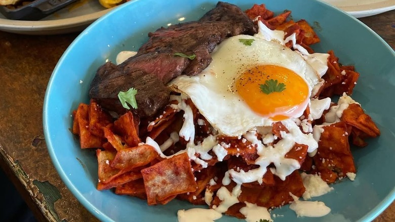 chiliquiles and steak with a fried egg