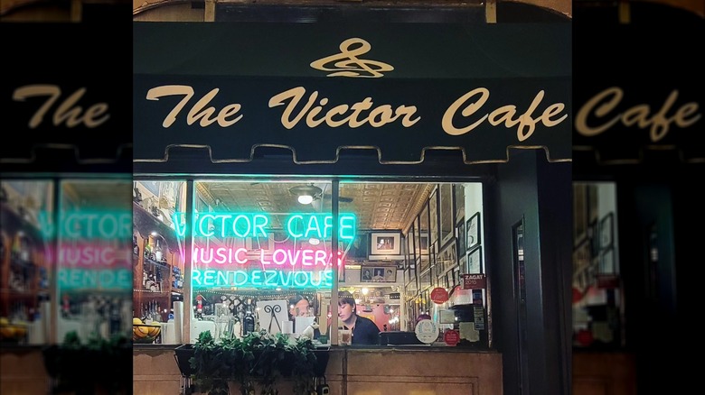 The exterior of Victor Cafe at night