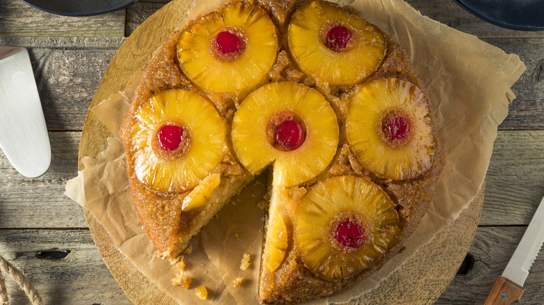 Pineapple upside-down cake with a slice cut out