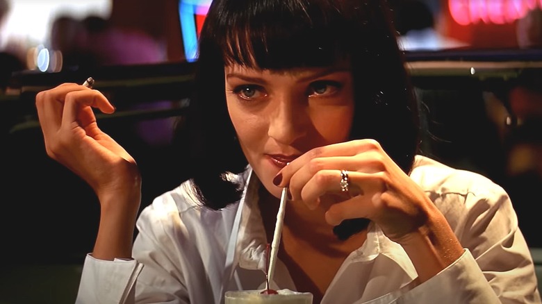 Uma Thurman drinking a milkshake in pulp fiction