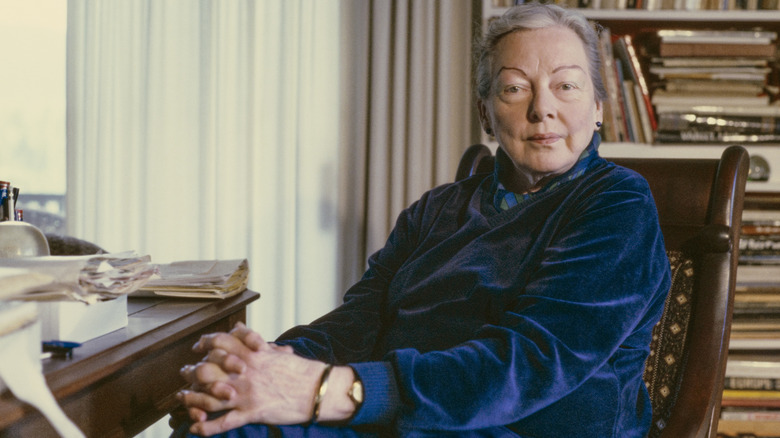 Portrait of M.F.K. Fisher sitting at her desk in her later years