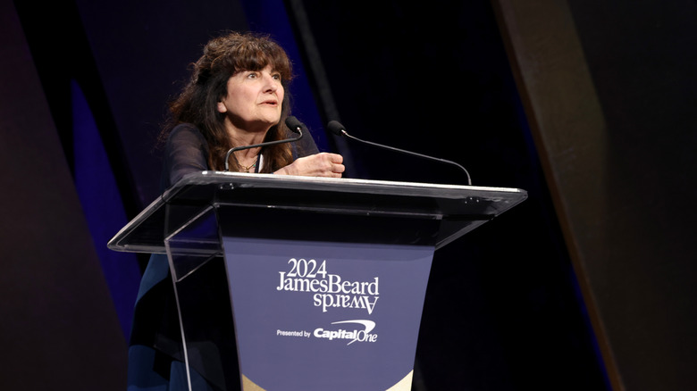 Ruth Reichl speaking at podium for 2024 James Beard Awards