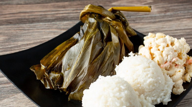 Plate of Hawaiian lau lau with rice and macaroni salad