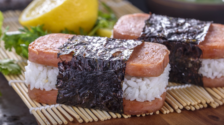 Spam musubi on bamboo mat