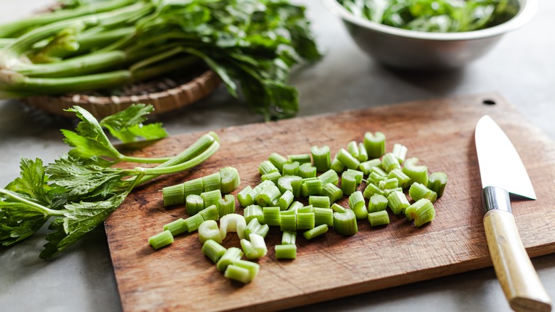 Chopped celery on a cutting board