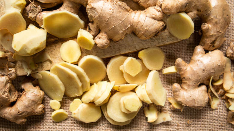 Sliced ginger root on a cutting board
