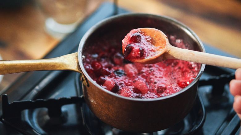 Cranberry sauce cooking in a kitchen
