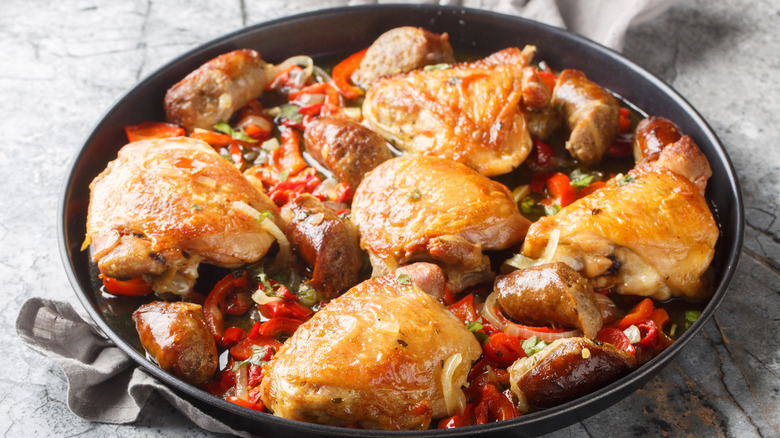 Cast iron pan of chicken scarpariello
