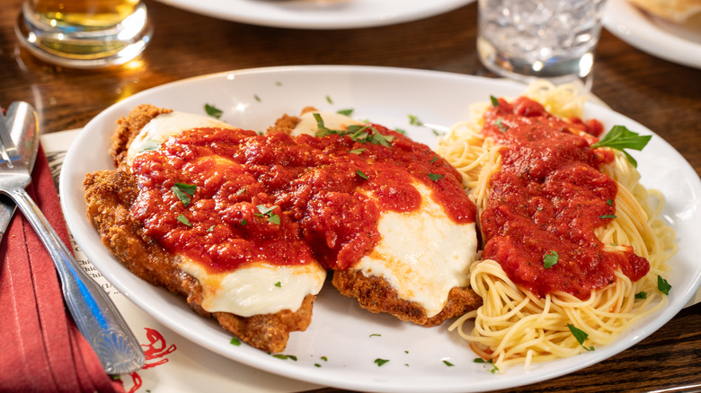 Veal Parmigiana with spaghetti and red sauce