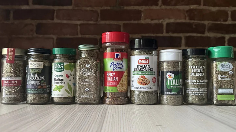 various bottles of Italian seasoning on a kitchen counter