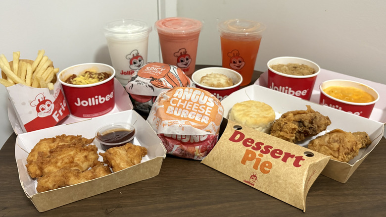 Assorted Jollibee food and drinks on table