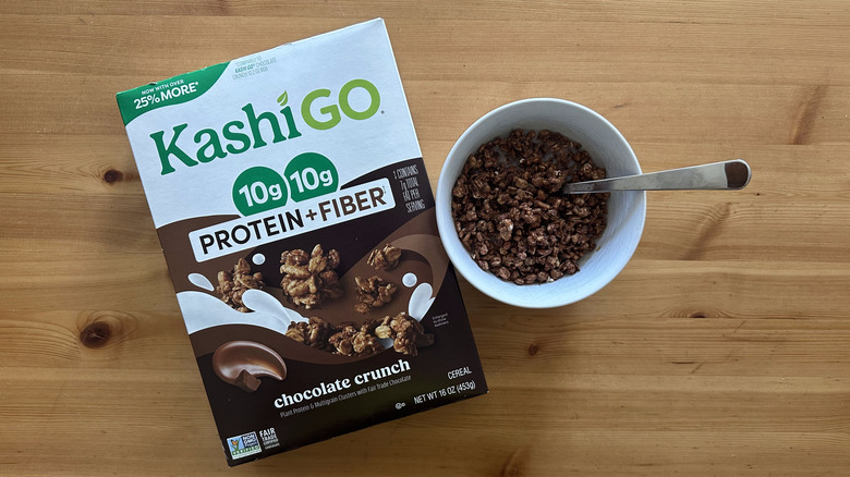 Kashi Go Protein and Fiber Chocolate Crunch in white bowl on wooden table