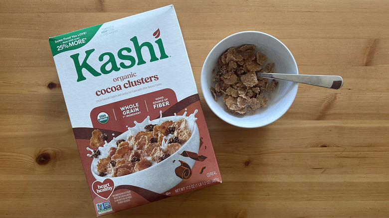 Kashi Organic Cocoa Clusters in white bowl on wooden table