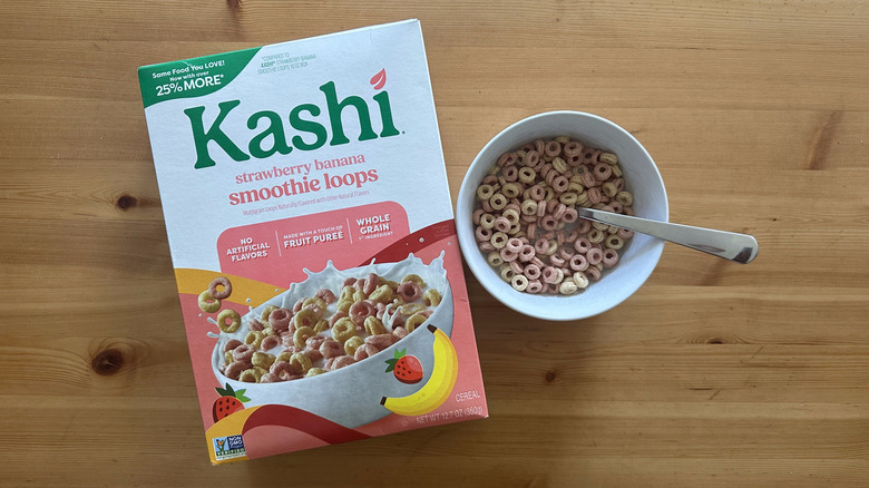 Kashi Strawberry Banana Smoothie Loops in white bowl on wooden table