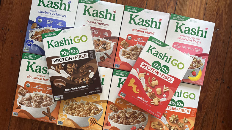 Kashi cereal boxes on wooden background