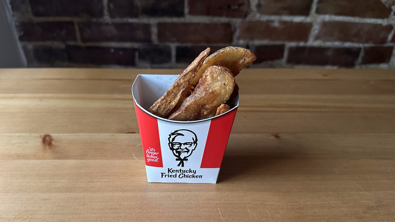 KFC Potato Wedges on wooden table