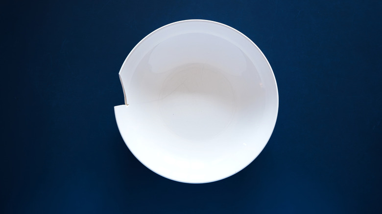 Chipped white against a dark blue background