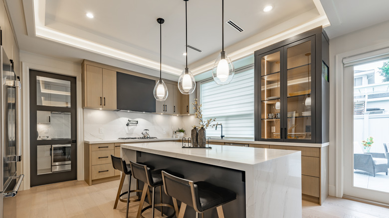 Kitchen island with waterfall edge and seating