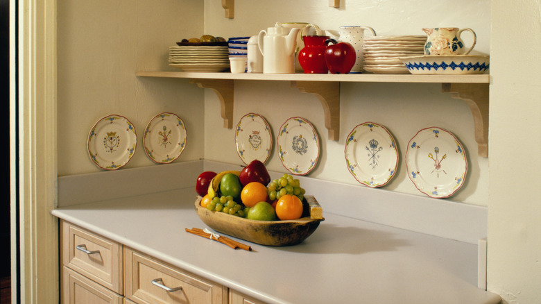 Empty kitchen countertop with a single fruit bowl