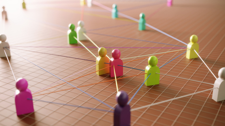 Communication concept connecting several multi-colored abstract icons