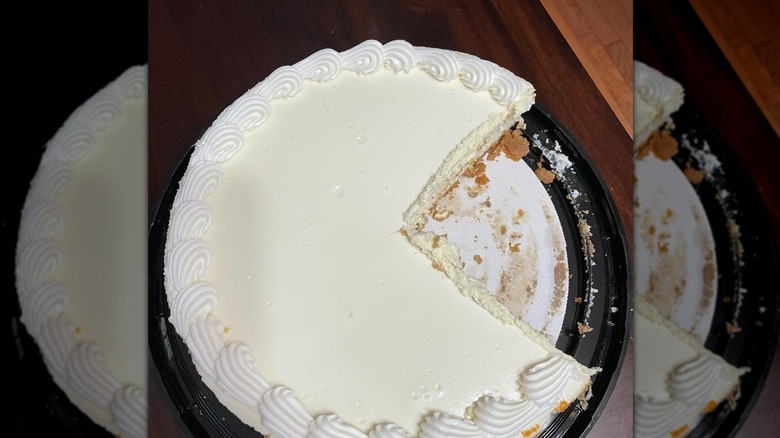 Costco cheese cake with a large slice cut out