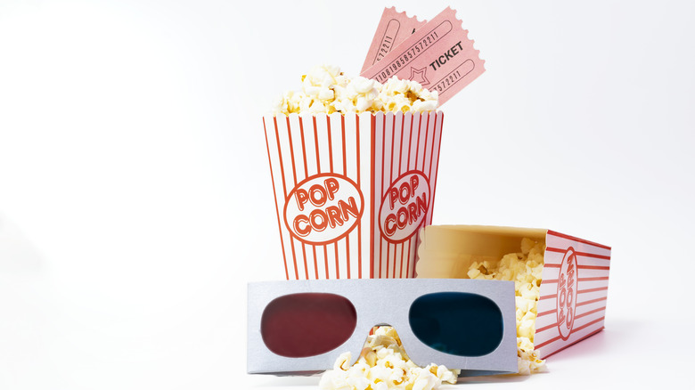 Popcorn, movie tickets, and 3D glasses