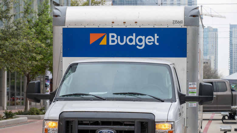 Budget moving truck in a city