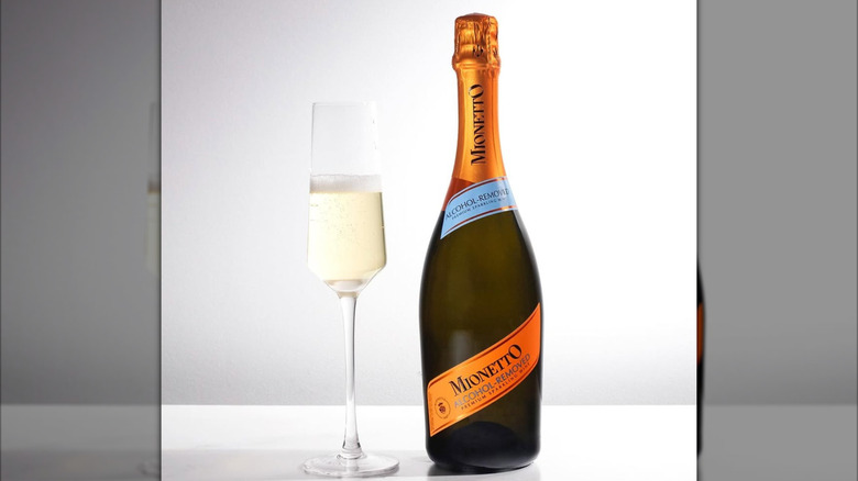 bottle of Mionetto Alcohol-Removed Sparkling Wine with flute
