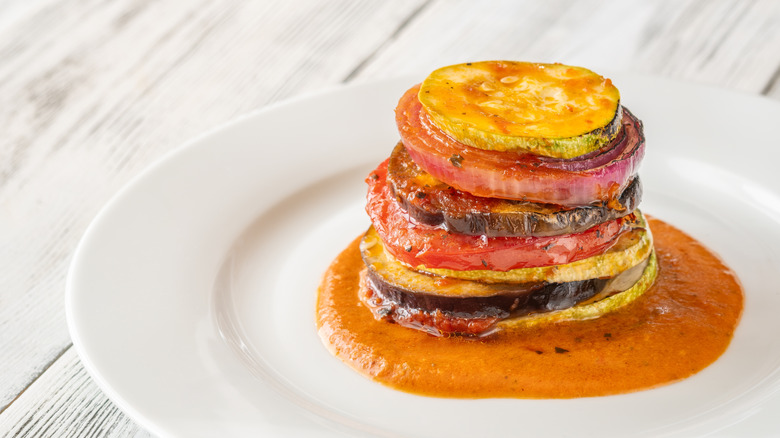 An image of stacked veggies that make ratatouille
